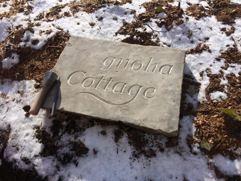 Hand carved house name on reclaimed yorkstone